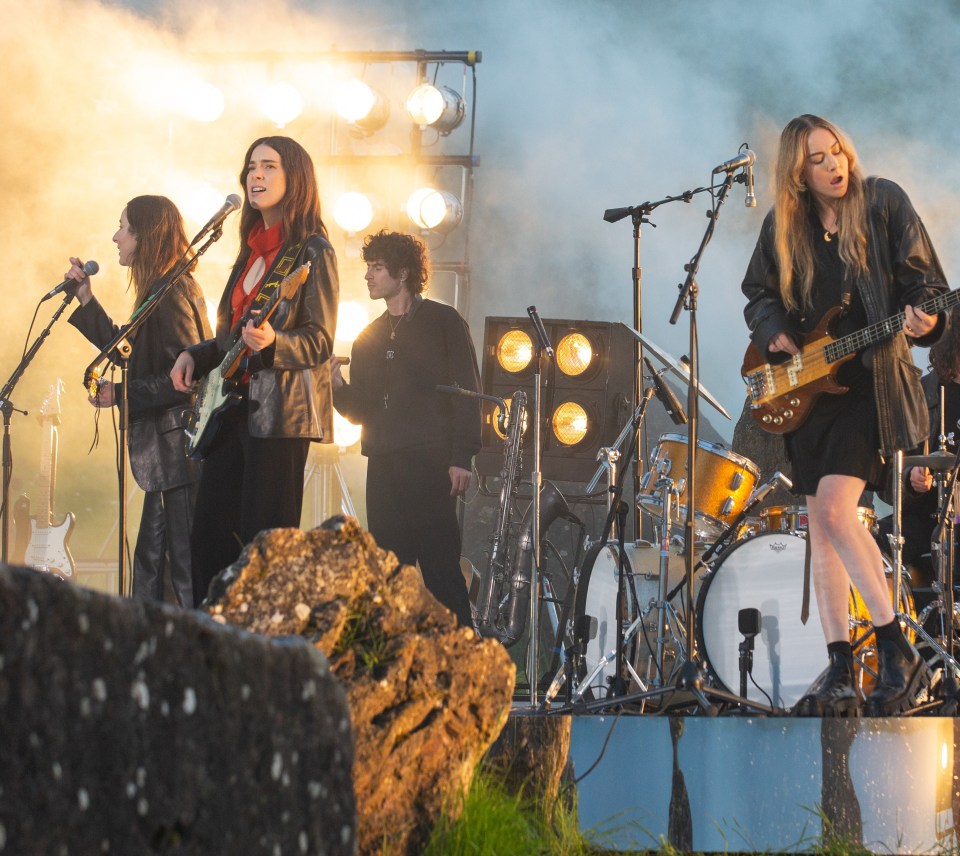 Haim, above playing Glastonbury's global live stream last May, are also pencilled in for the Pyramid Stage on the Saturday