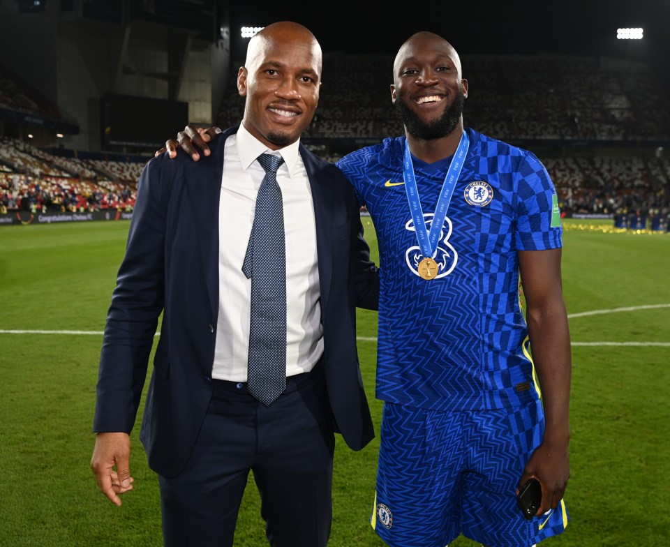 Drogba alongside Chelsea striker Romelu Lukaku