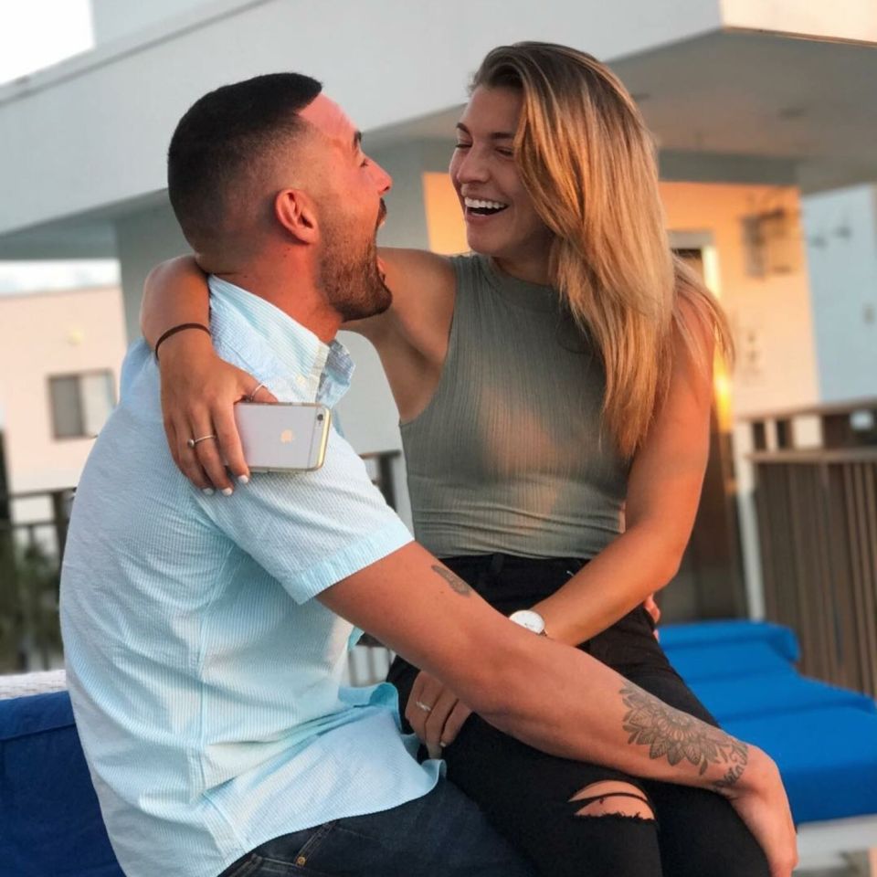 Sutton keeper Dean Bouzanis with his footballer girlfriend Steph Catley