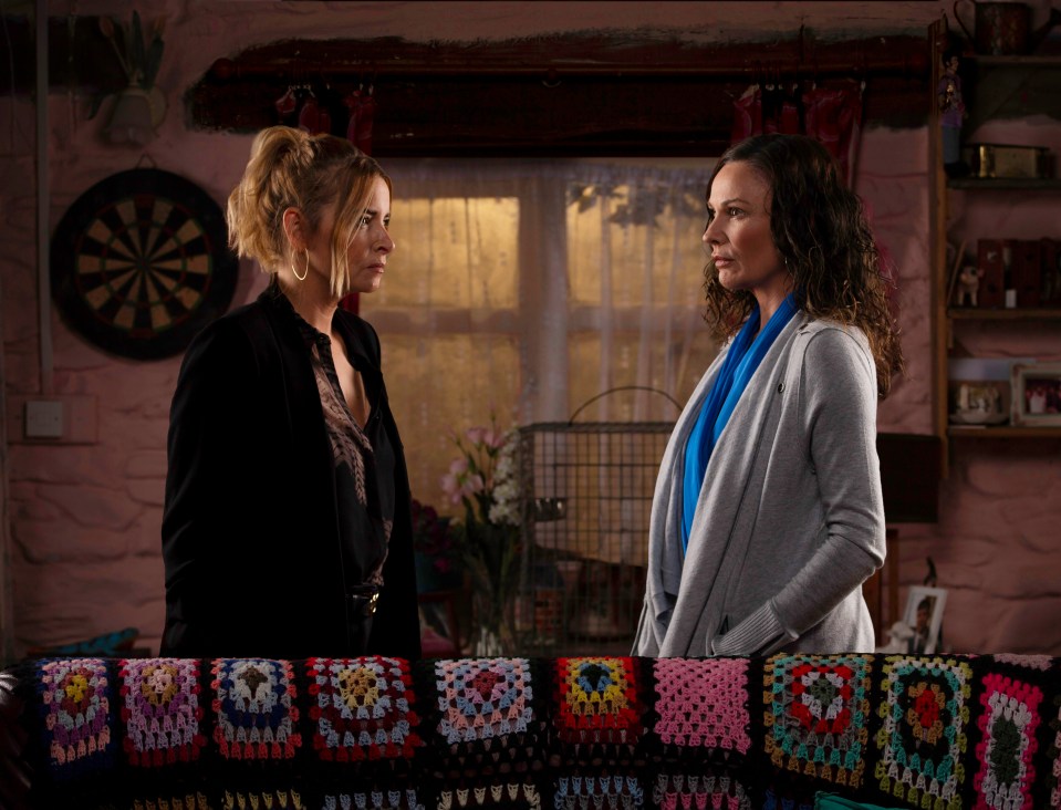 Chas and Charity cross swords for The Woolpack