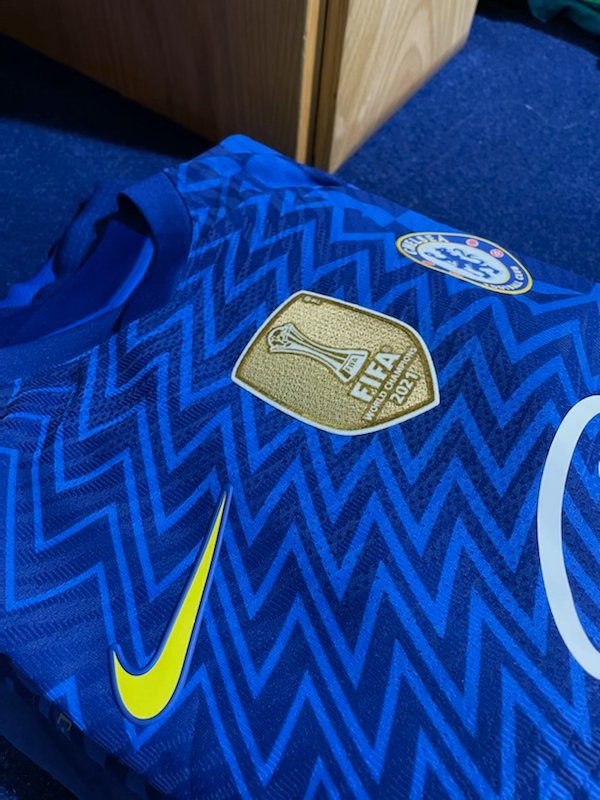 Chelsea have revealed how the badge looks on their blue jersey