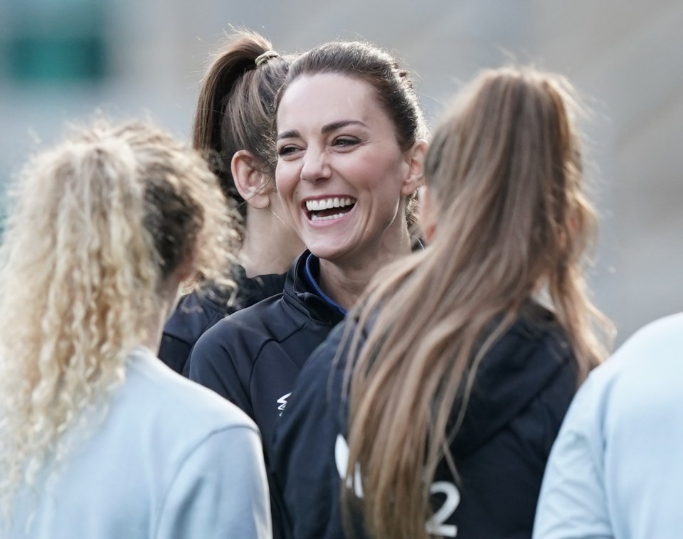 The duchess grinned as she joined the stars at training