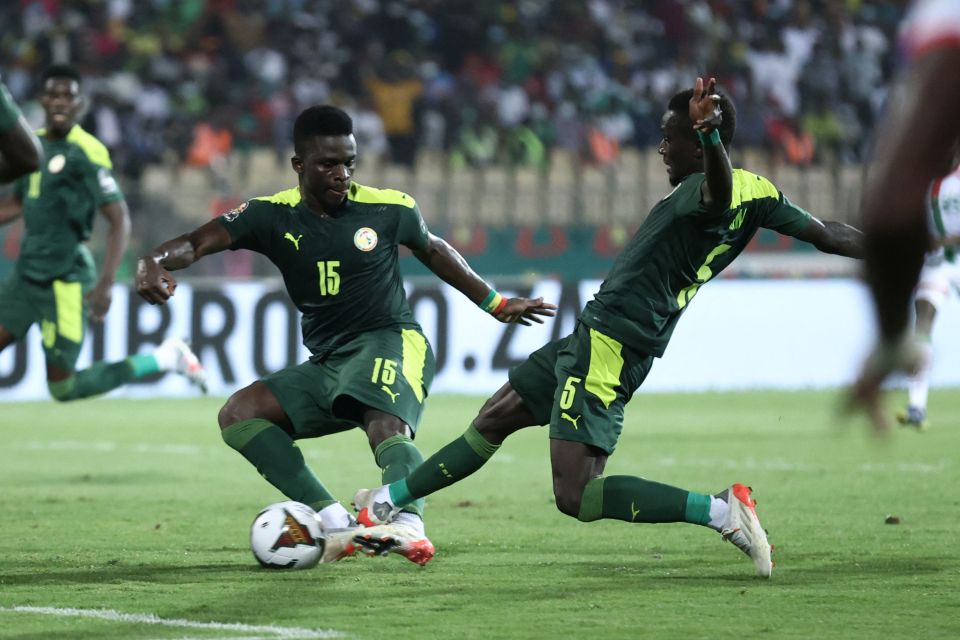 Idrissa Gueye, right, got the final touch ahead of team-mate Bamba Dieng for 2-0