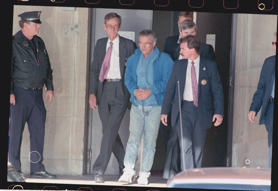 Jim Bakker in chains after being sentenced for fraud in 1990