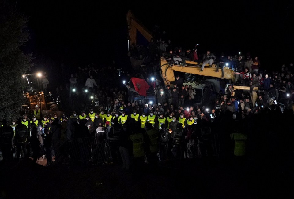 A little boy trapped down a well has died, Morocco's king confirmed tonight. Images show the moment a team carried the five-year-old out on a stretcher