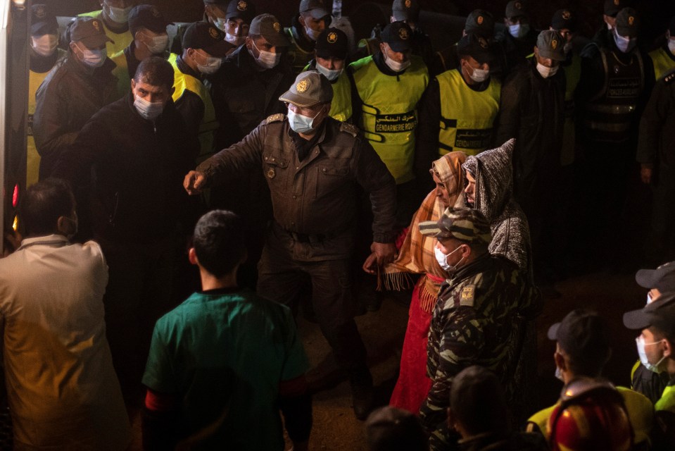 Rayan was rescued after more than 100 agonising hours. His distraught parents are seen being led to an ambulance tonight