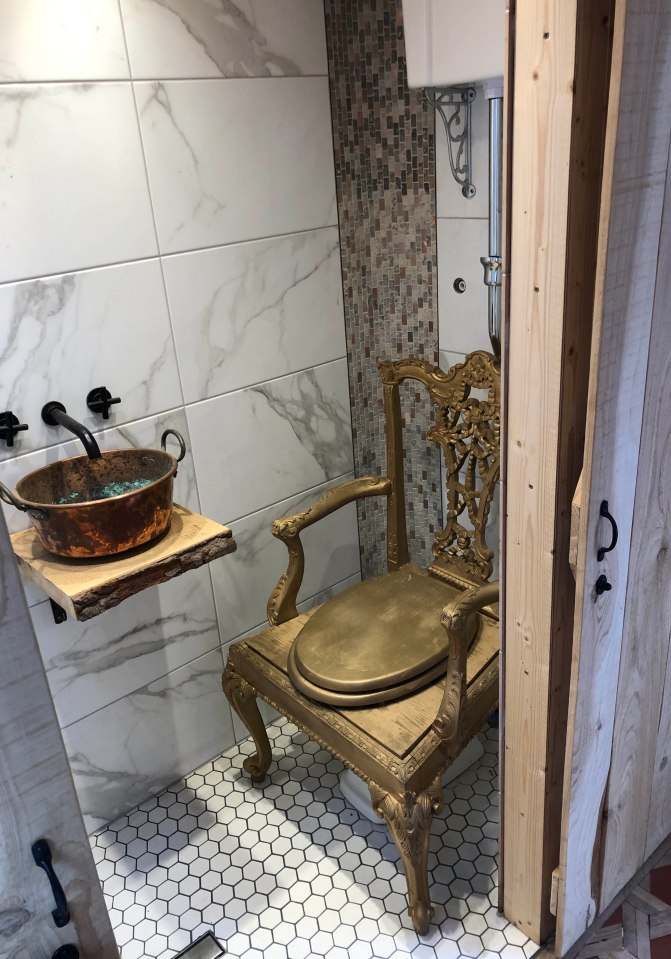 There is also a 'golden throne' over the toilet