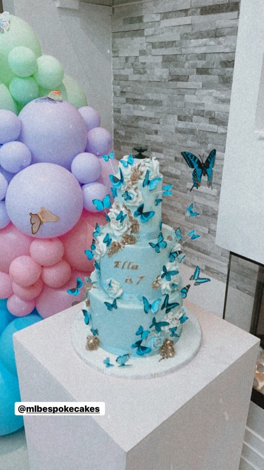 Jac had a butterfly-themed three-tier cake made for the occasion