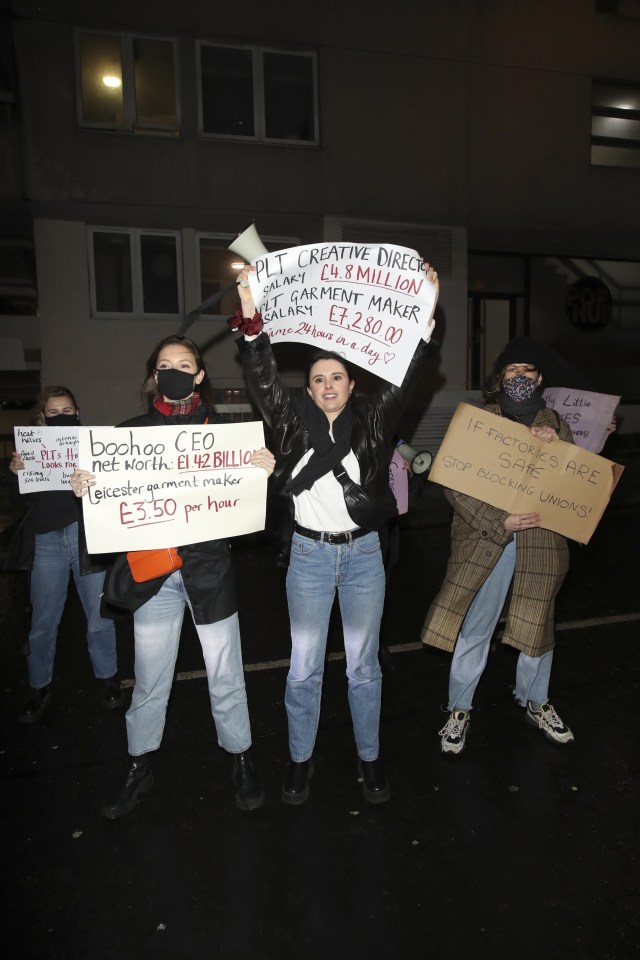 Around 20 people gathered outside the The Londoner Hotel, Leicester Square, holding signs and shouting through megaphones