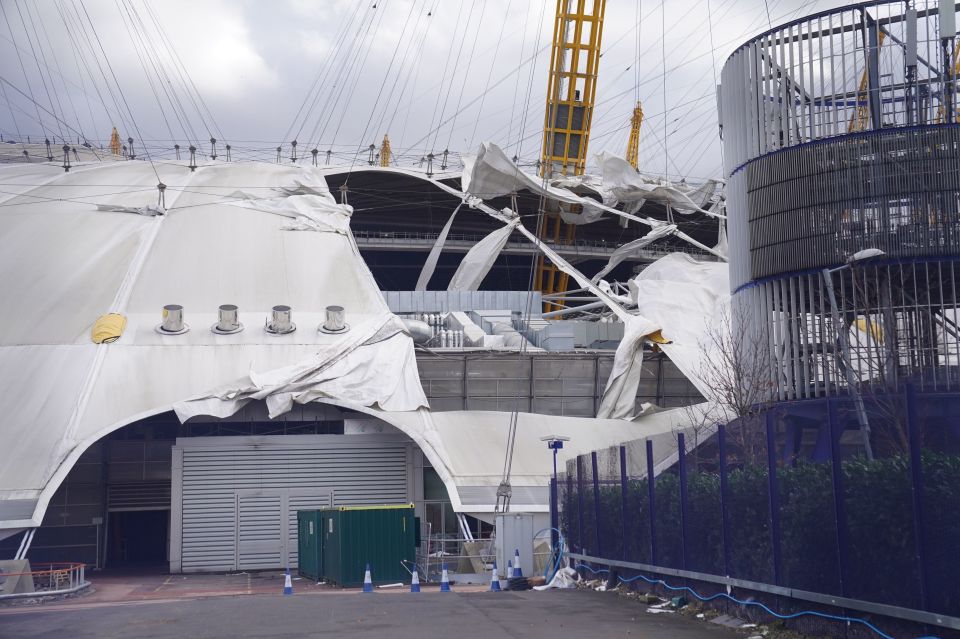 The white sheeting was torn to shreds in the storm