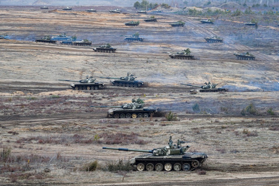 Russian tanks move during military drills in Belarus