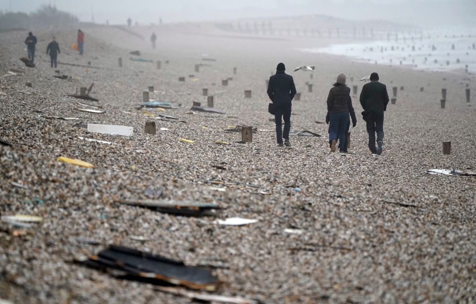 In Bracklesham Bay, West Sussex, debris has been dragged onto the beach by huge swells