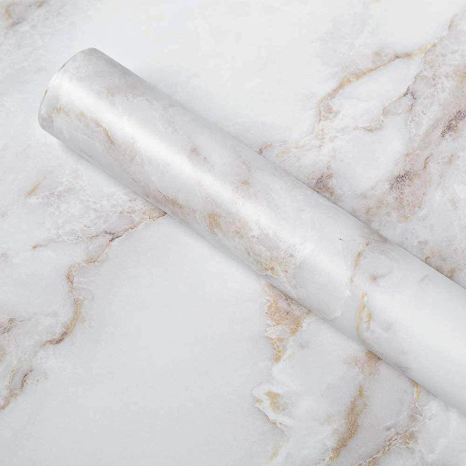 Marble vinyl is an effective and cheap way to revamp multiple items around the home