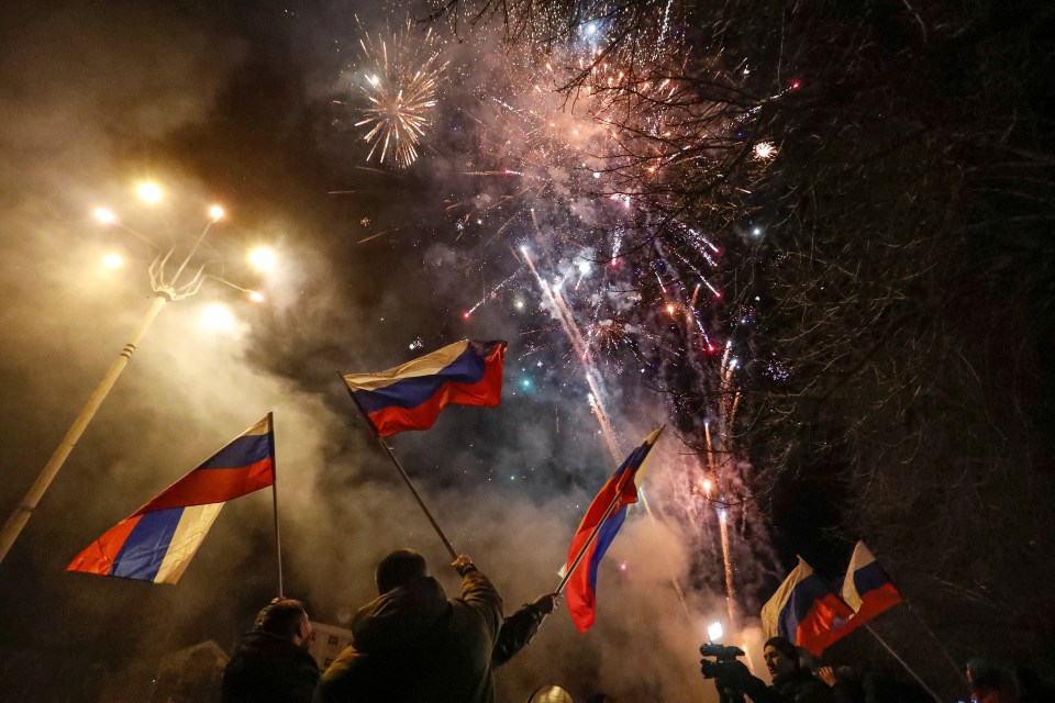 They reacted by letting off fireworks and waving flags