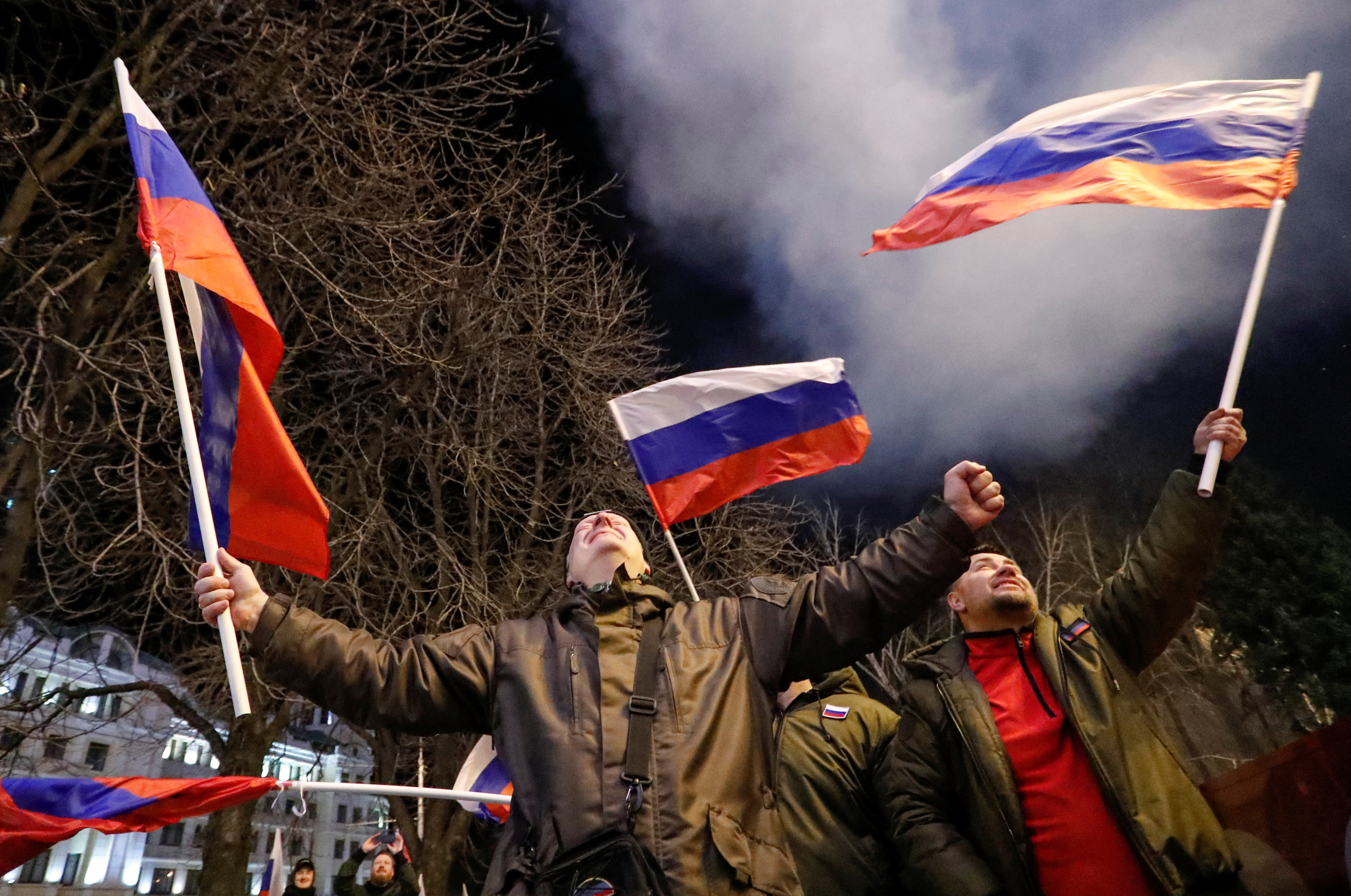 Stage-managed demonstrations of supporters waving Russian flags sprang up in Donetsk as Putin’s troops rolled in on Monday night