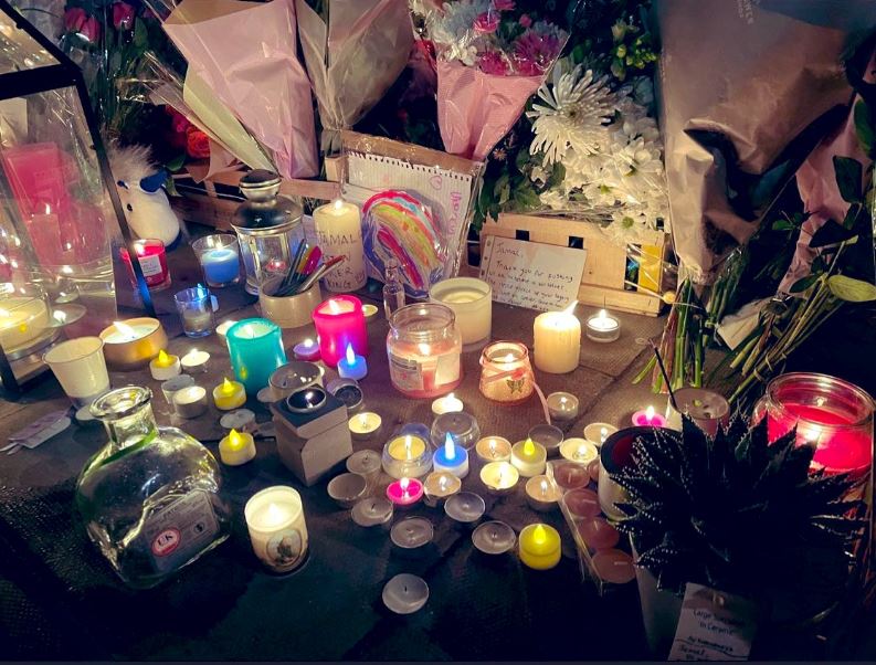 People left flowers, cards and candles in the star's memory