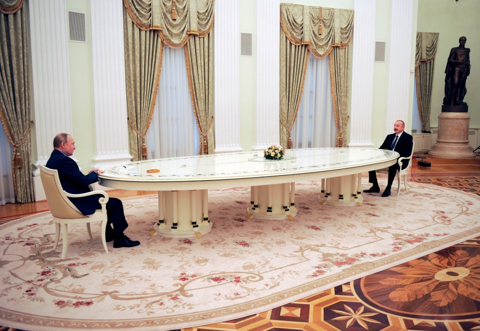 Vladimir Putin with President Ilham Aliyev of Azerbaijan yesterday