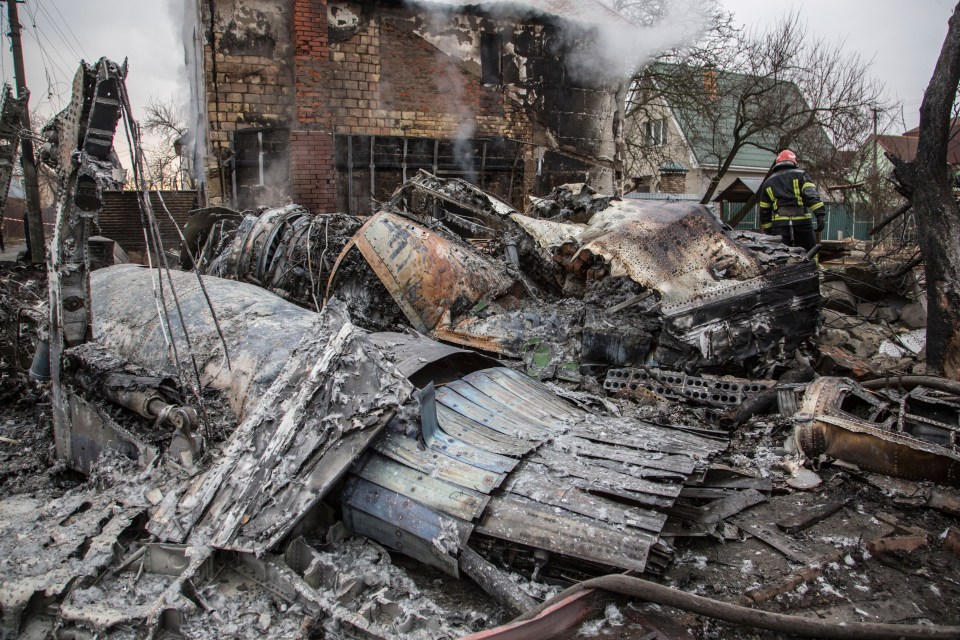 Wreckage after a warplane was shot down overnight over Kyiv