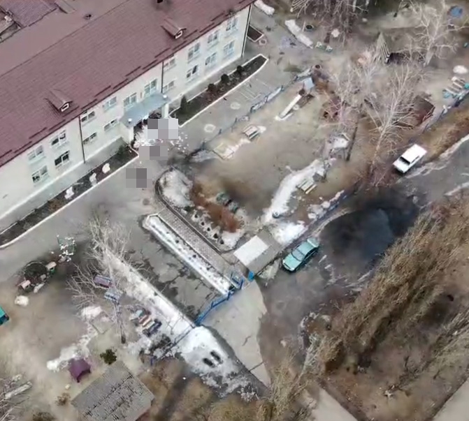 Footage taken by a drone shows the scene - with the slides, sandbox and play area visible