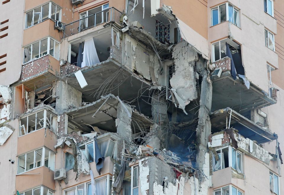 The missile slammed into the side of the apartments