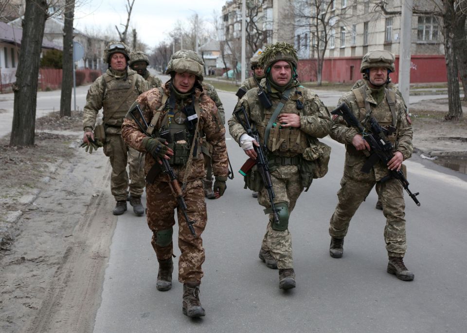 Ukrainian troops and civilians are fighting against Putin's invasion