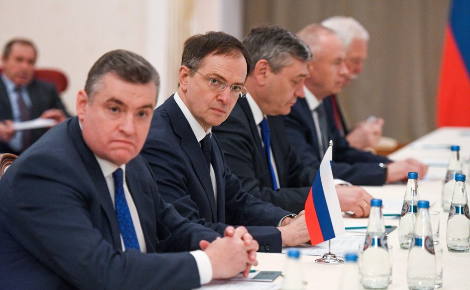 Russian delegates attending the peace talks