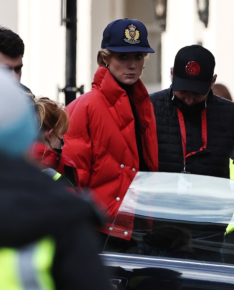 Elizabeth Debicki celebrates Princess Diana's love of chunky red puffer jackets