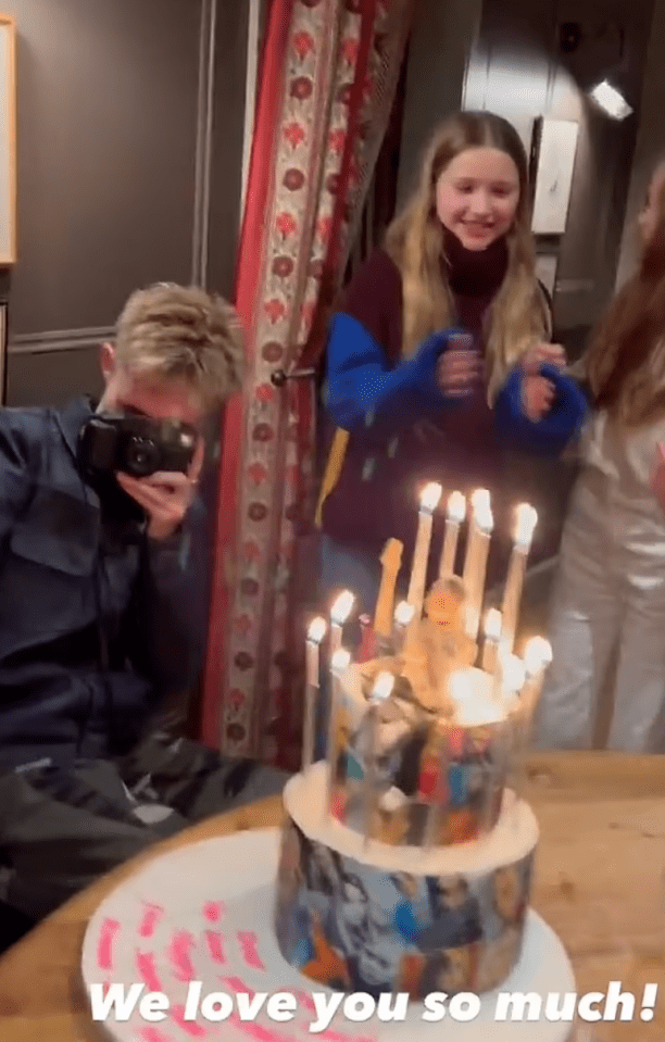 His family and friends carried a Billie Eilish-themed cake to an array of cheers