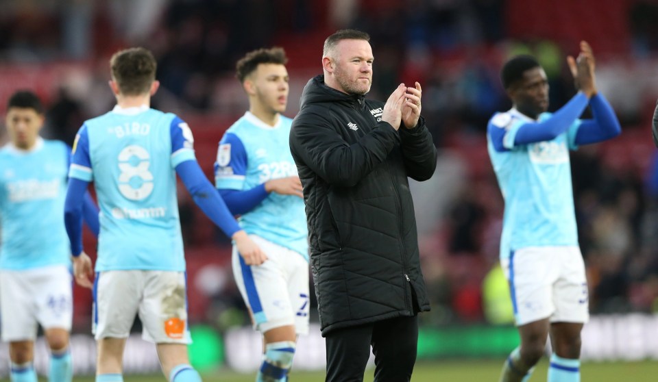 Wayne Rooney applauds the travelling fans as a 4-1 loss at Middlesbrough on Saturday left Derby four points from safety