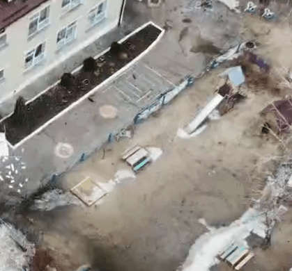 Pictures show the playground visible next to the blast damage