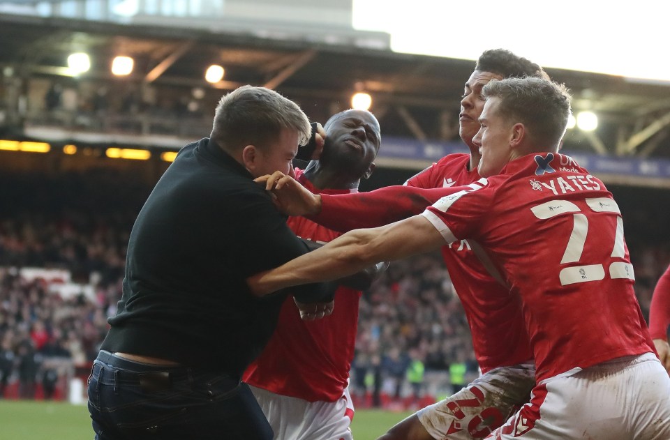 Cameron Toner punches Nottingham Forest's Keinan Davis