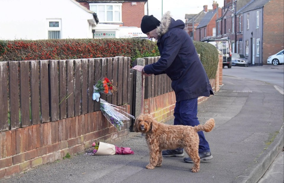 Locals have left tributes to the tragic tot