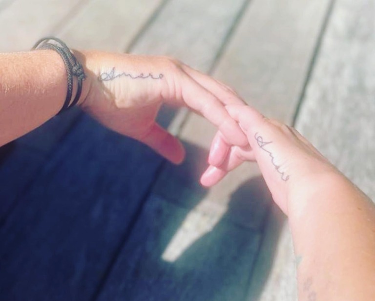 The make-up artist revealed she and James got matching 'amore' tattoos on their break