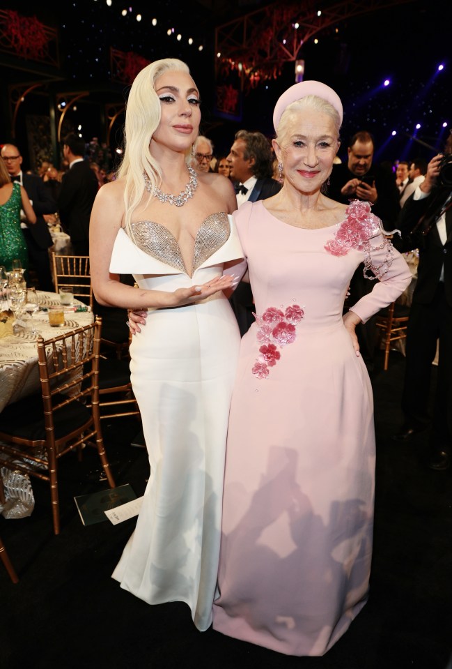 Dame Helen Mirren poses with Lady Gaga at the 28th SAG Awards