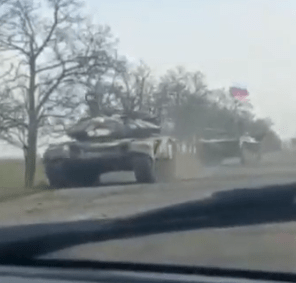 Russian tanks flying their flag moving for Putin’s assault