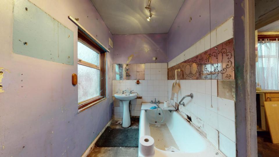 The bathroom is located on the ground floor