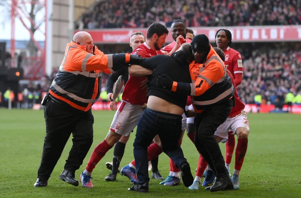 He was charged with assaulting three Nottingham Forest players