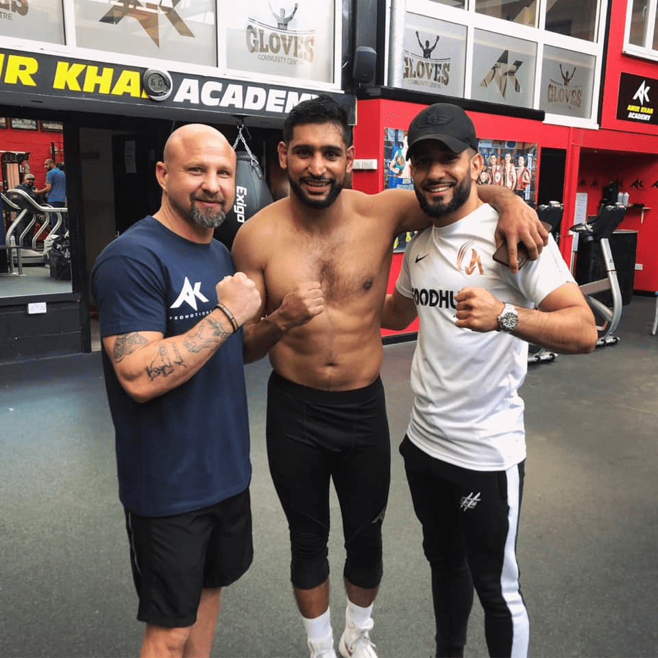 Clarence ‘Bones’ Adams, left, next to Amir Khan