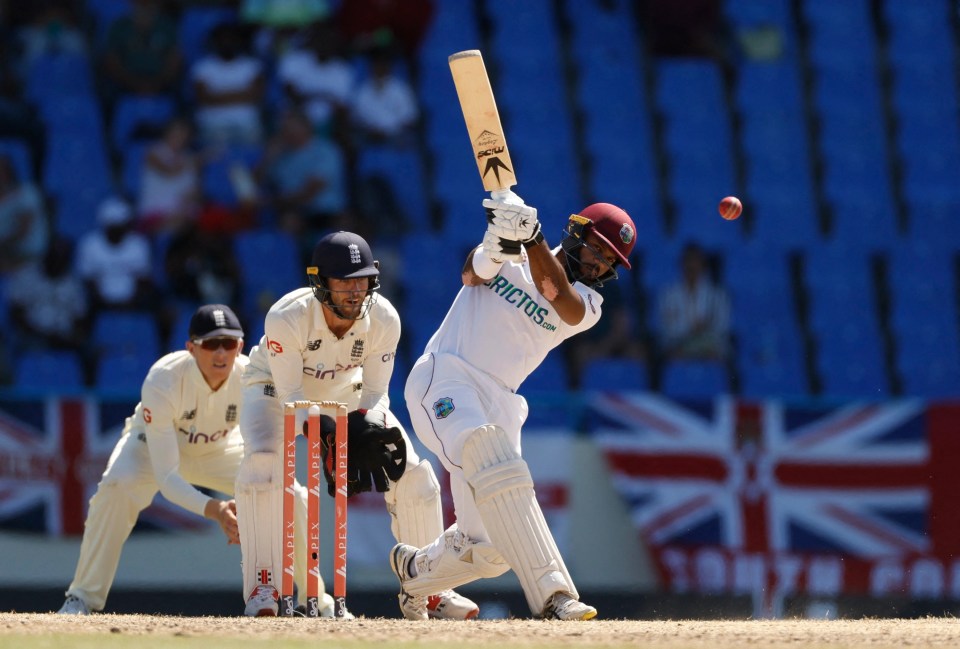 Windies' opener John Campbell hits out off Jack Leach and is caught by Craig Overton