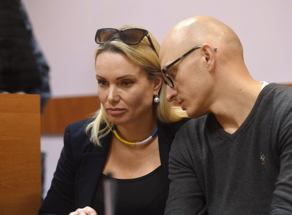 Ovsyannikova, left, and lawyer Anton Gashinsky before the court session