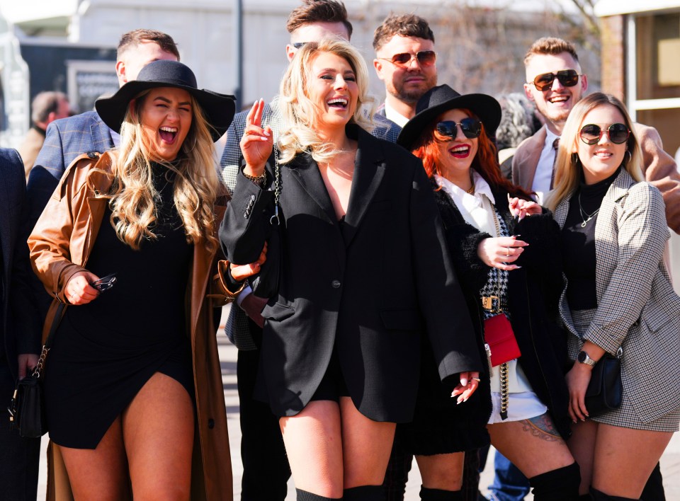 Daring dresses and thigh-high boots appear to be the dress code for many on day three