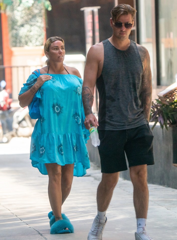 She was seen arriving  in blue fluffy slippers with fiance Carl Woods