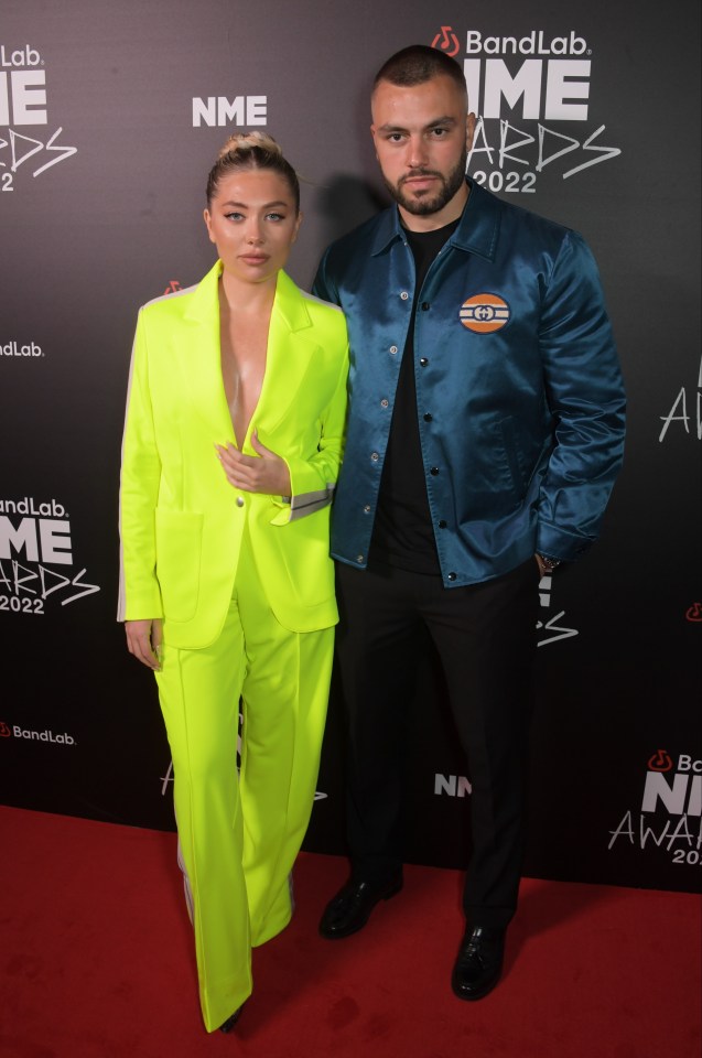 Love Island's Paige Turley looked striking in a neon suit with her boyfriend Finn Tapp