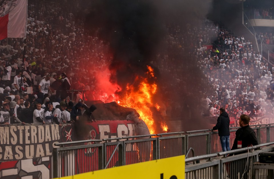 Black smoke ascended around the stadium