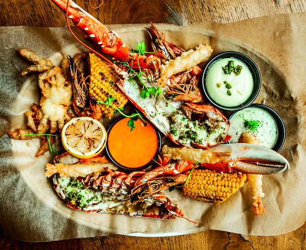 Go big and order the seafood sharing platter, including a grilled lobster and tempura prawns