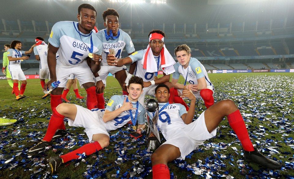 Guehi celebrates winning the U17 World Cup with team-mates Rhian Brewster, George McEarchran, Callum Hudson-Odoi, Tashan Oakley-Boothe and Conor Gallagher