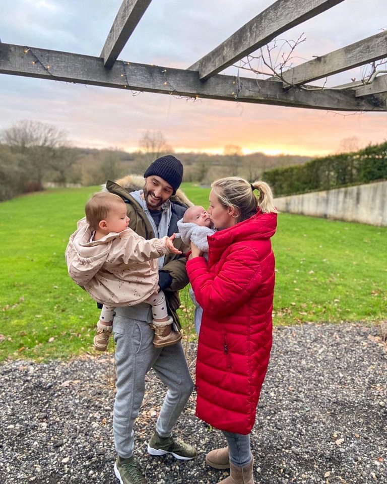 Tom pictured with his wife Kelsey and their children Aurelia and Bodhi