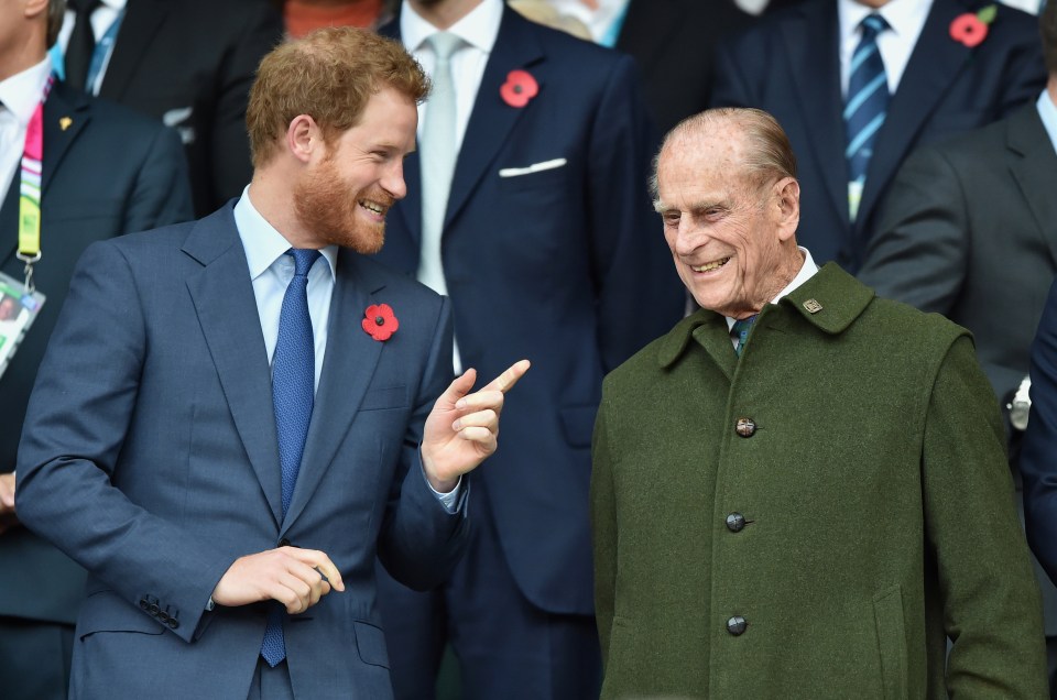 Prince Harry pictured with his late grandfather in 2015