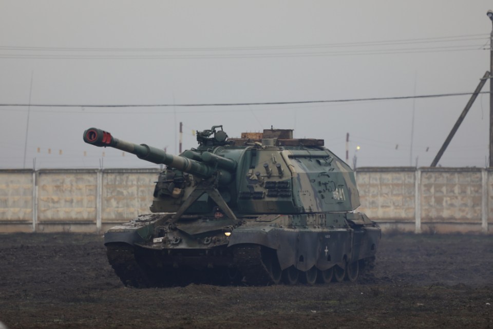 A Russian T-72B3 tank, also struck in the blast