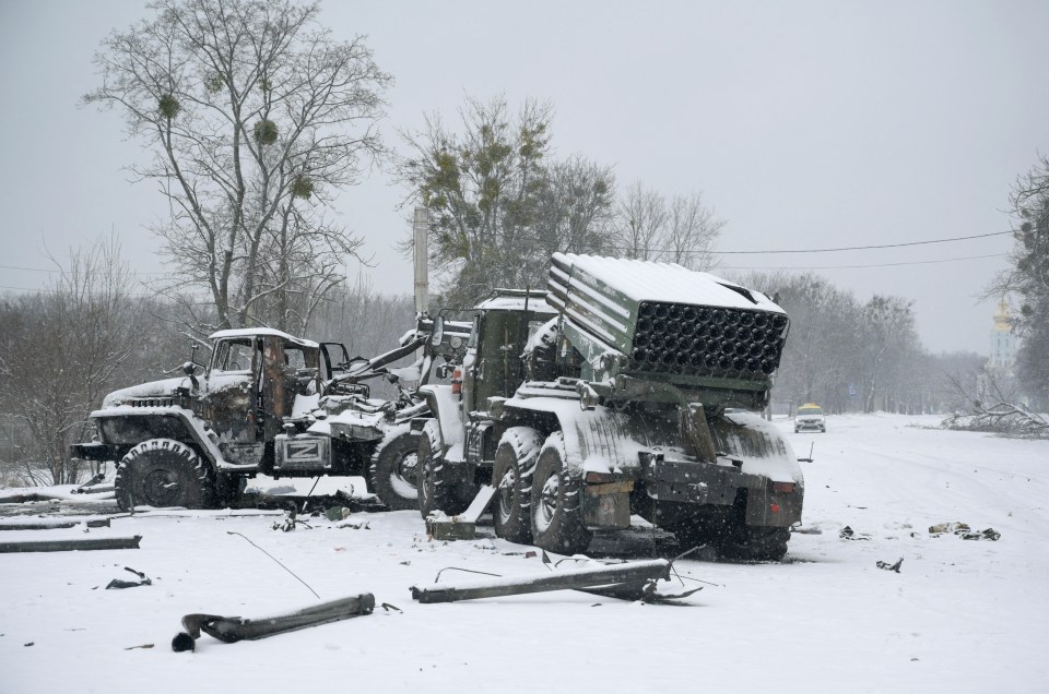 Russian rocket launchers sit abandoned by the roadside